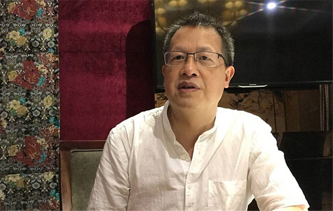 羅偉章《誰在敲門》：每個時代下的人們，骨髓里都敲打著古歌