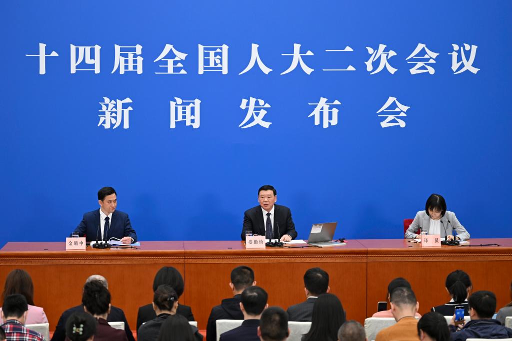 3月4日，十四屆全國人大二次會議在北京人民大會堂舉行新聞發布會。大會發言人婁勤儉就大會議程和人大工作相關問題回答中外記者的提問。 新華社記者 牟宇 攝