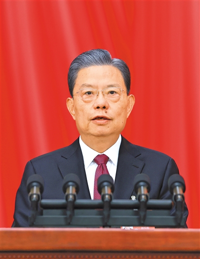 3月8日，十四屆全國人大二次會議在北京人民大會堂舉行第二次全體會議。受全國人大常委會委托，趙樂際委員長向大會報告全國人大常委會工作。 　　新華社記者 王 曄攝